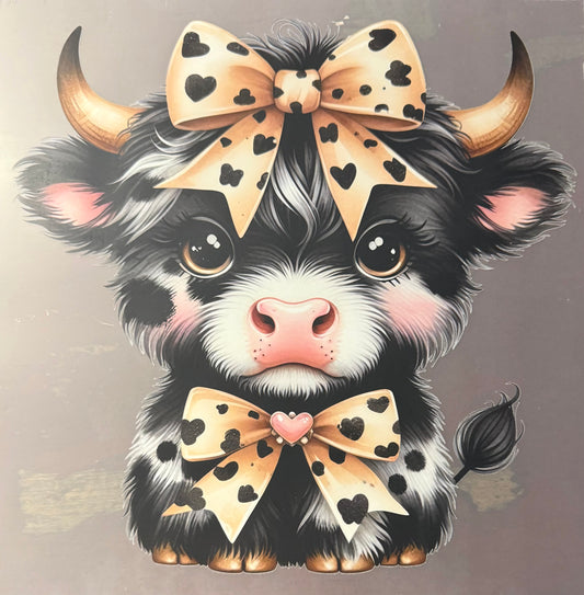 BLACK COW WITH BOWS