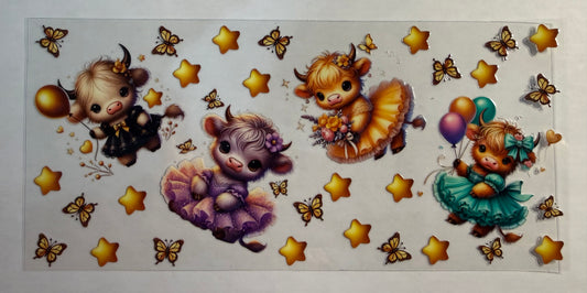 DRESSED UP COWS WITH GOLD STARS